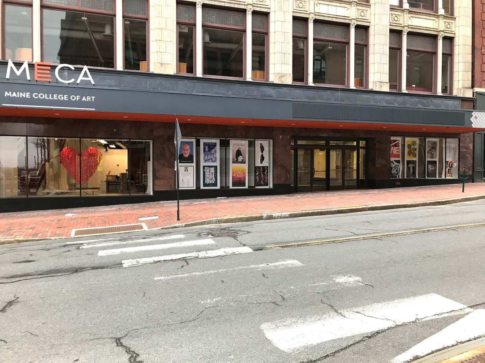 Poster on windows in front of school