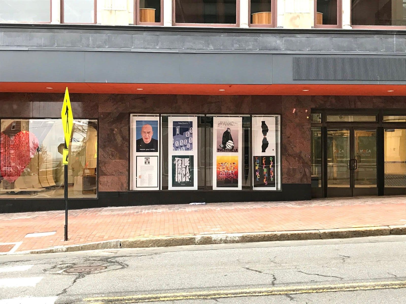 Poster on windows in front of school