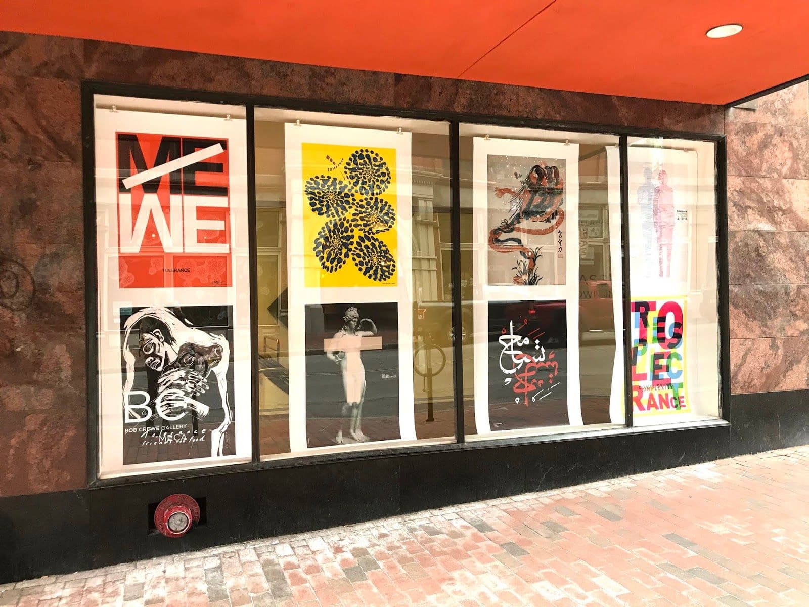 Poster on windows in front of school