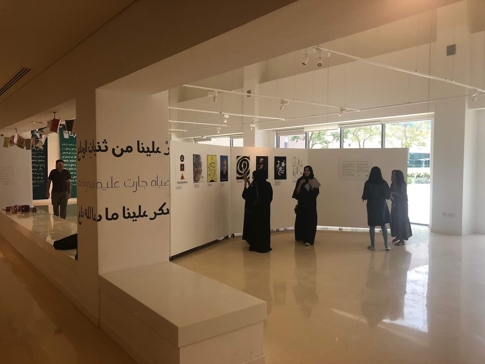 woman looking at posters