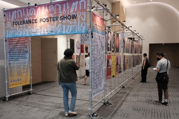 posters on metal grid
