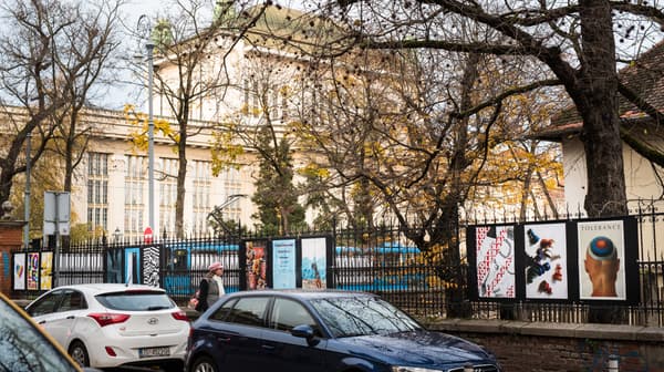 Posters on a fence