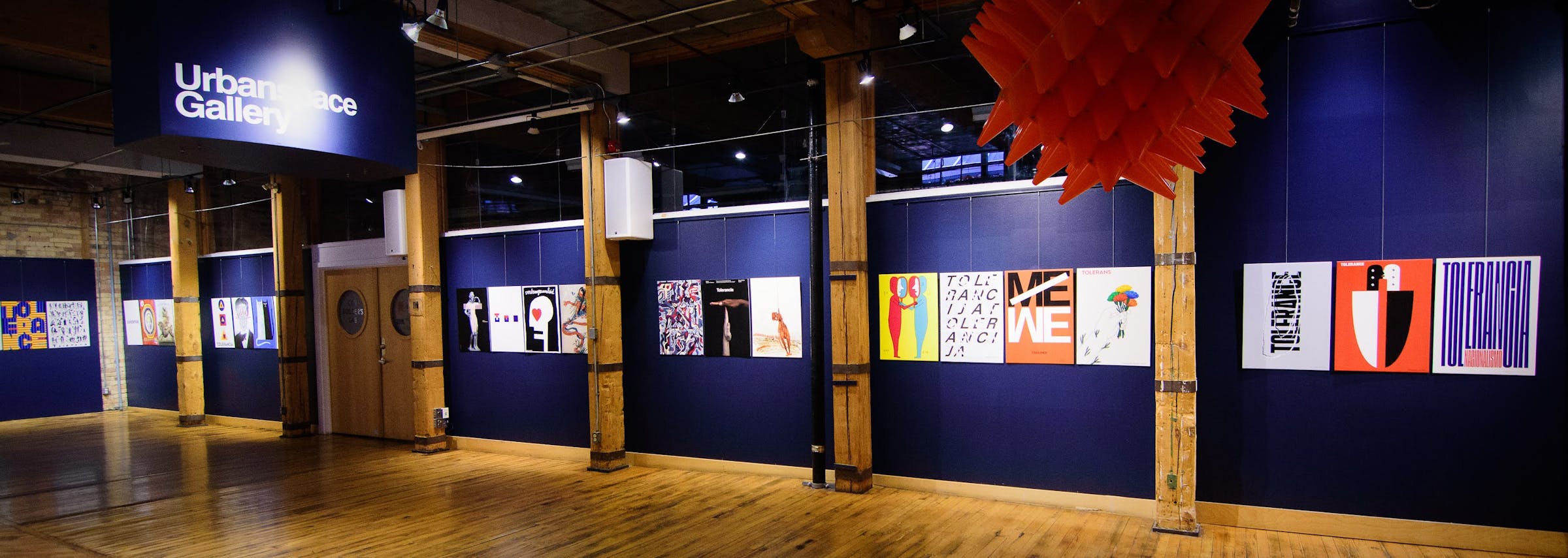 Tolerance posters on display in a gallery space